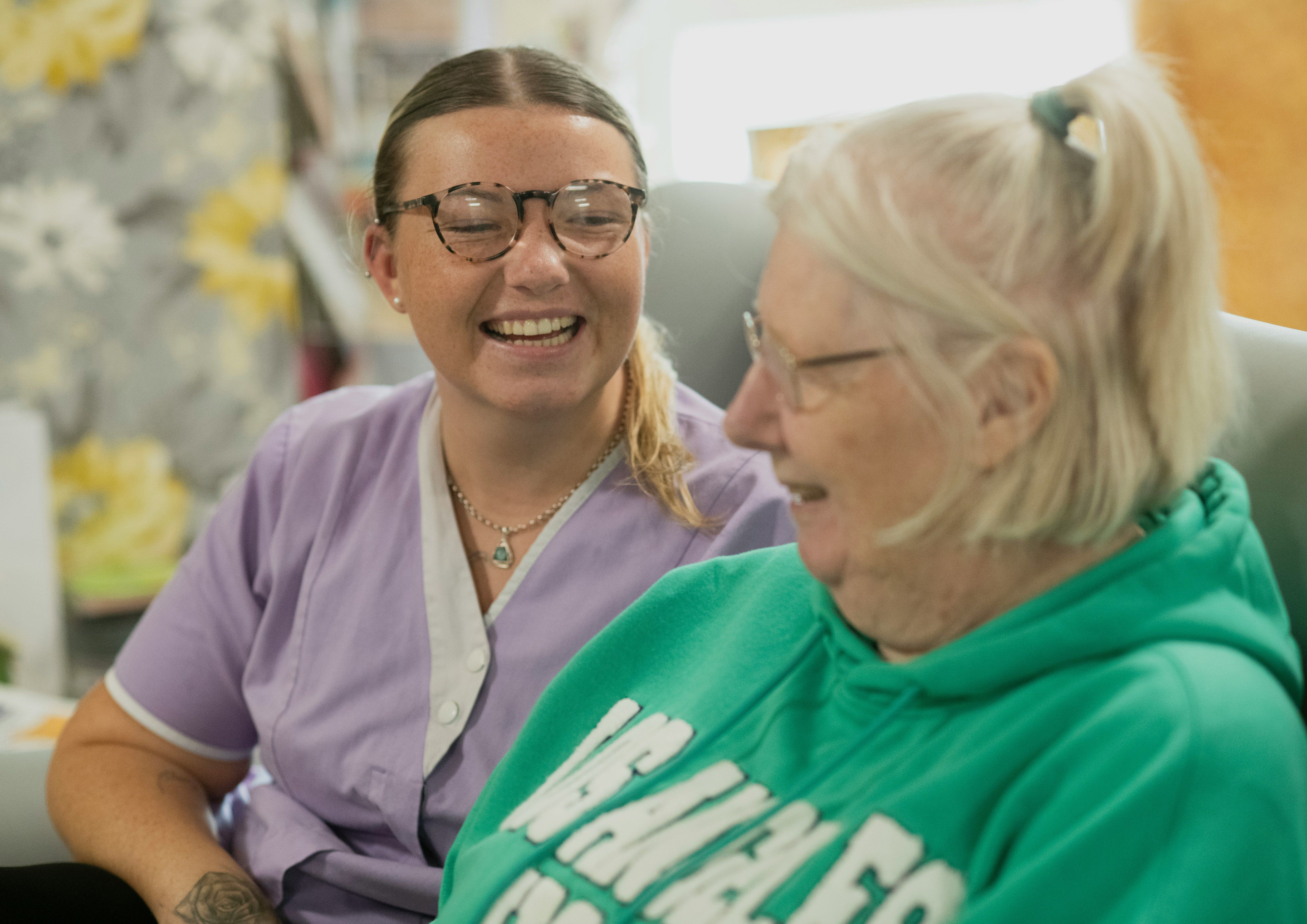 Carer spending time with a client